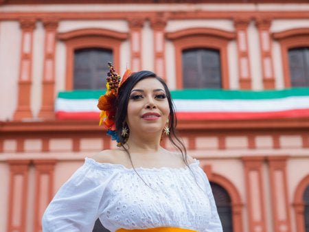 files/242077841-mexican-woman-in-traditional-white-dress-during-mexican-independence-day-celebration-street-portrait.jpg